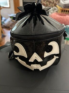 Black Glitter Pumpkin Crossbody Bag with White Jack-o'-Lantern Face—-mad engine
